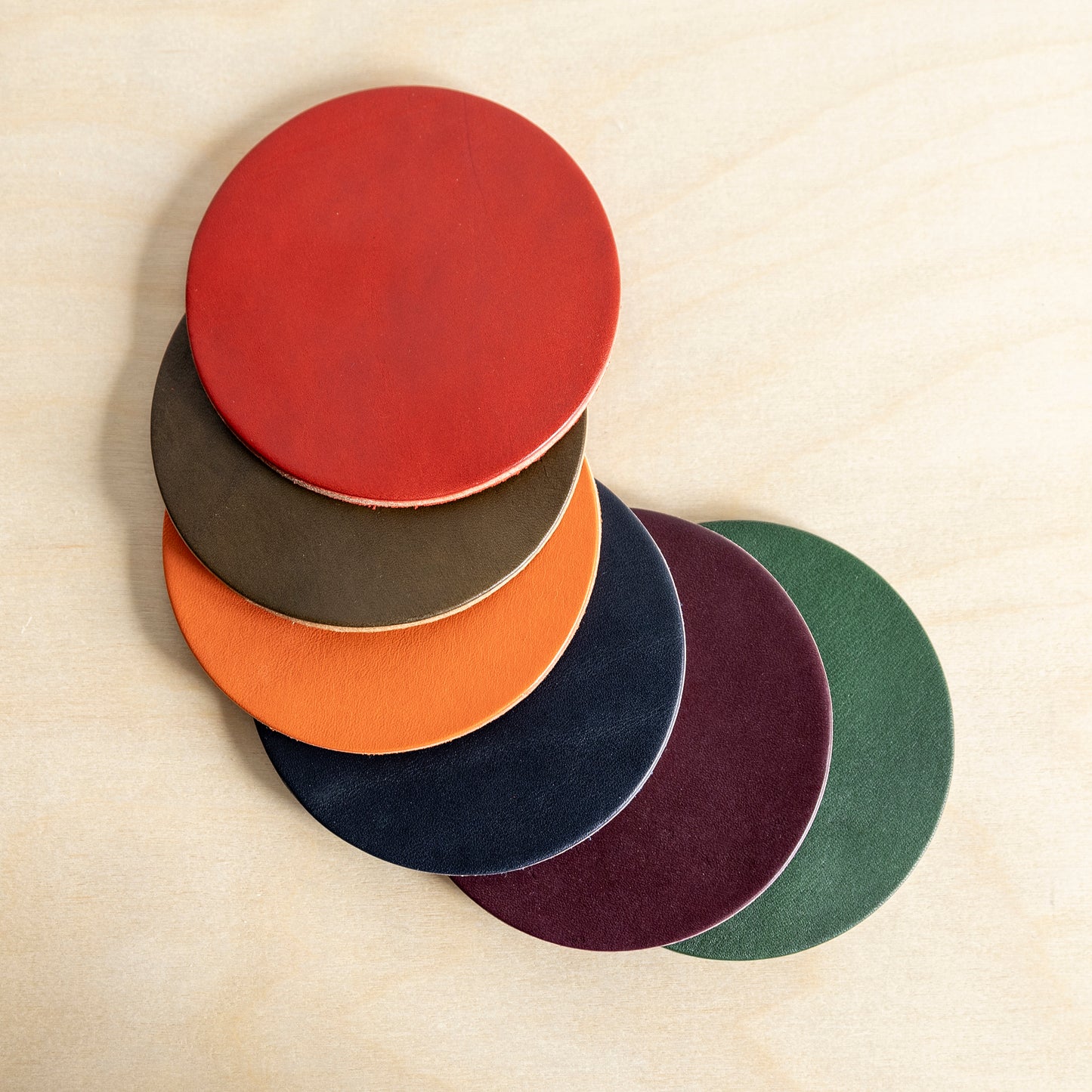 Set of 4 Leather Coasters, Zucchini